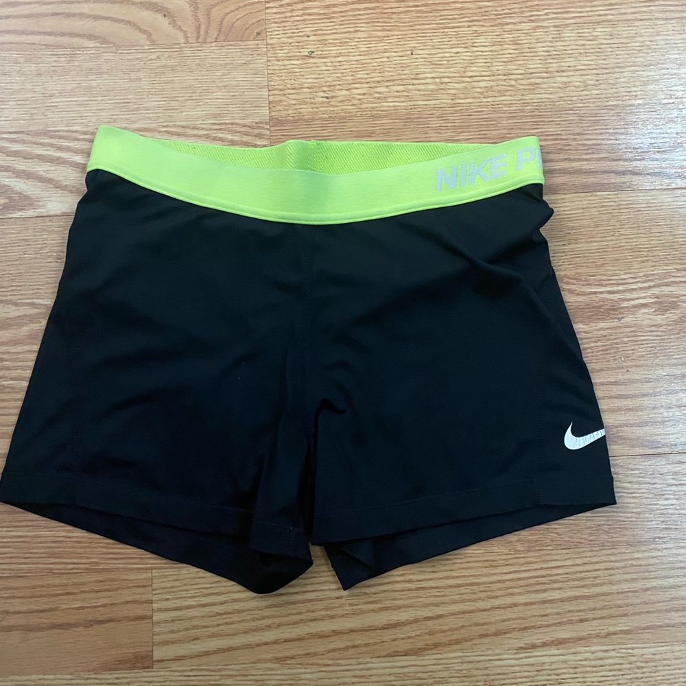 Black and Neon Green Woman’s Nike Pros